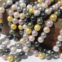 Perla Shell 6 mm, en colores verde, gris, rosado y amarillo, tira de 64 perlas aprox