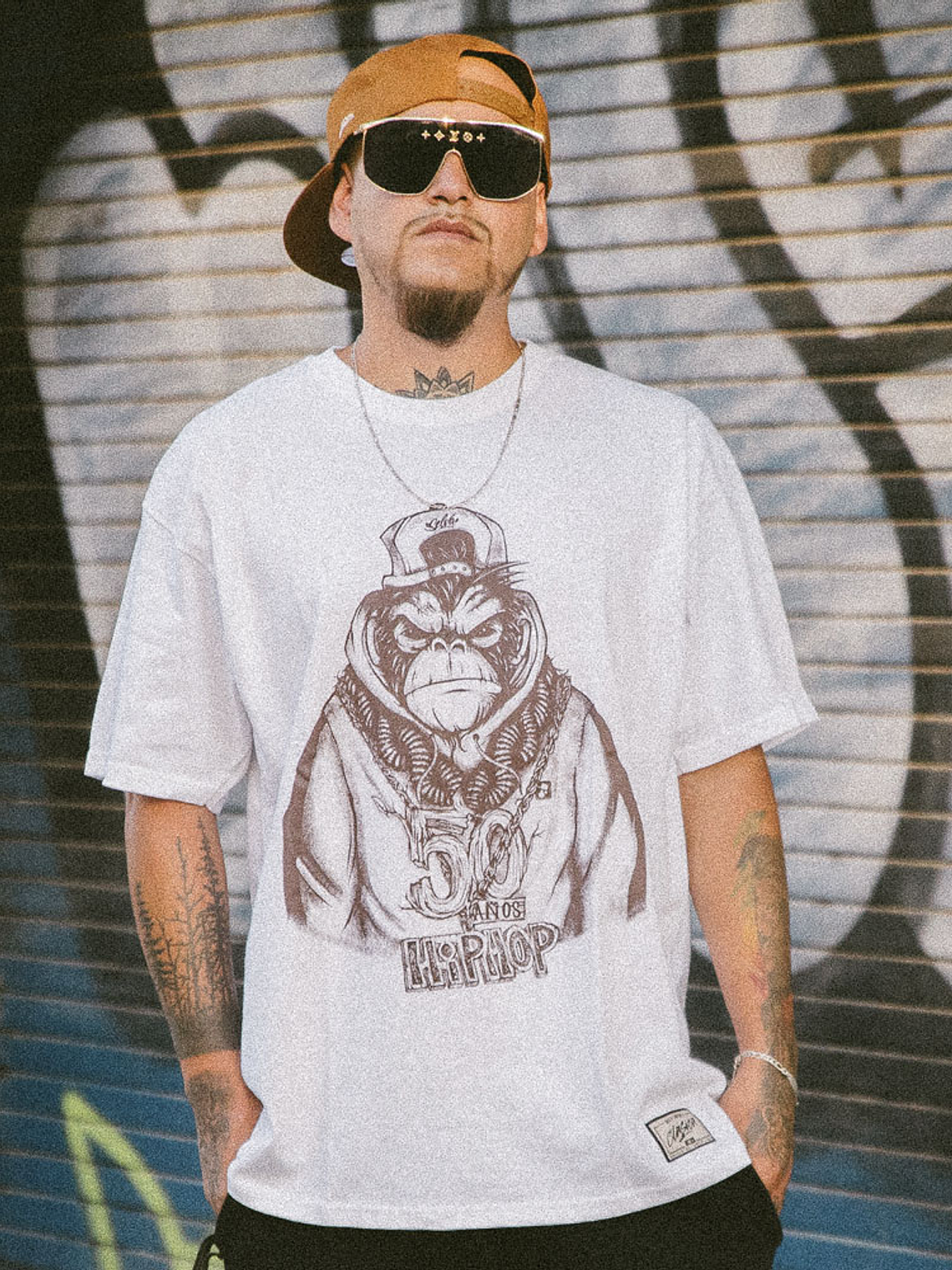 POLERA MONO HIP-HOP 50 AÑOS SELVA NEGRA 1