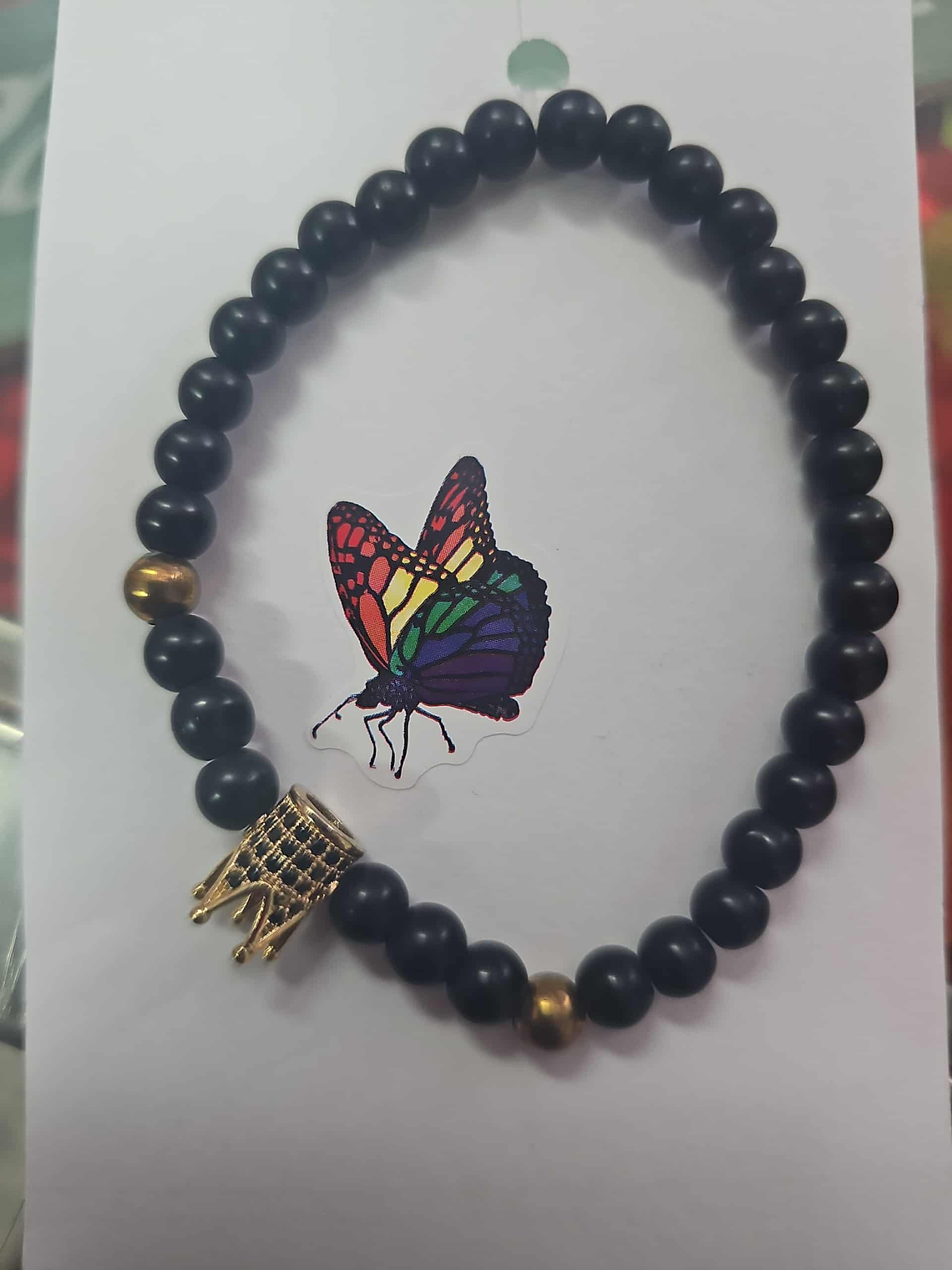 Pulseira Pedra Negra com Coroa Dourada – Realeza e Força 1
