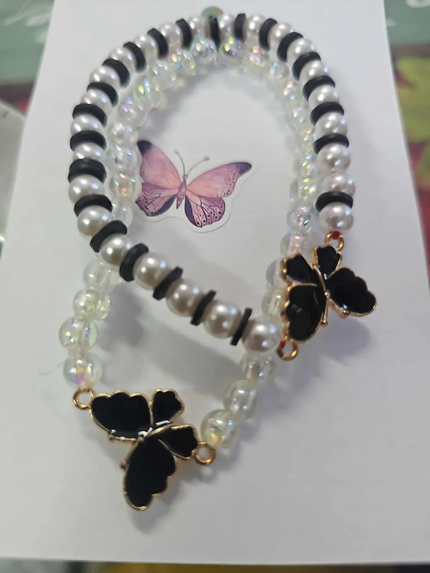 🖤🦋 Pulseiras Duplas Borboleta Negra – Elegância e Proteção ✨ 1