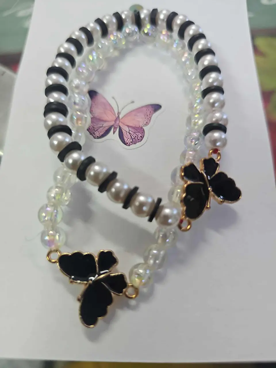 🖤🦋 Pulseiras Duplas Borboleta Negra – Elegância e Proteção ✨ 1