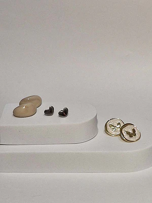 Aros circulares tipo boton mariposa  acero inoxidable