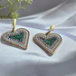 Aros corazón bordados con mostacillas y baño dorado - Miniatura 1