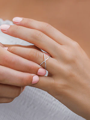 Anillo cruzado de  plata 950 con cadenita