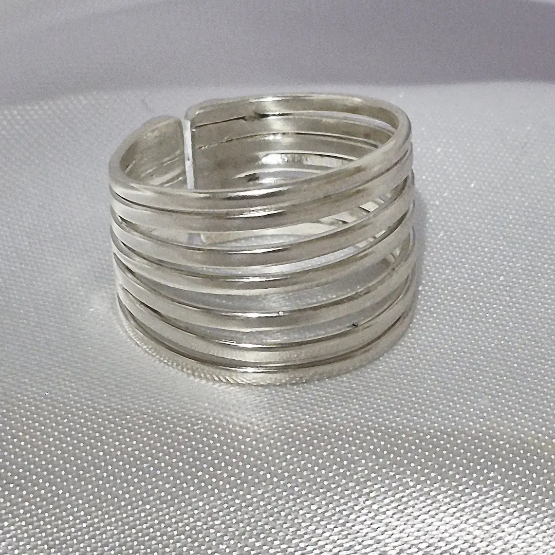 Anillo de cinco líneas juntas plata 950 1