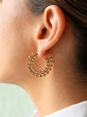 Aros estilo caracol baño de oro