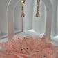 Aros largos enchapados en oro con piedras rosadas - Miniatura 1