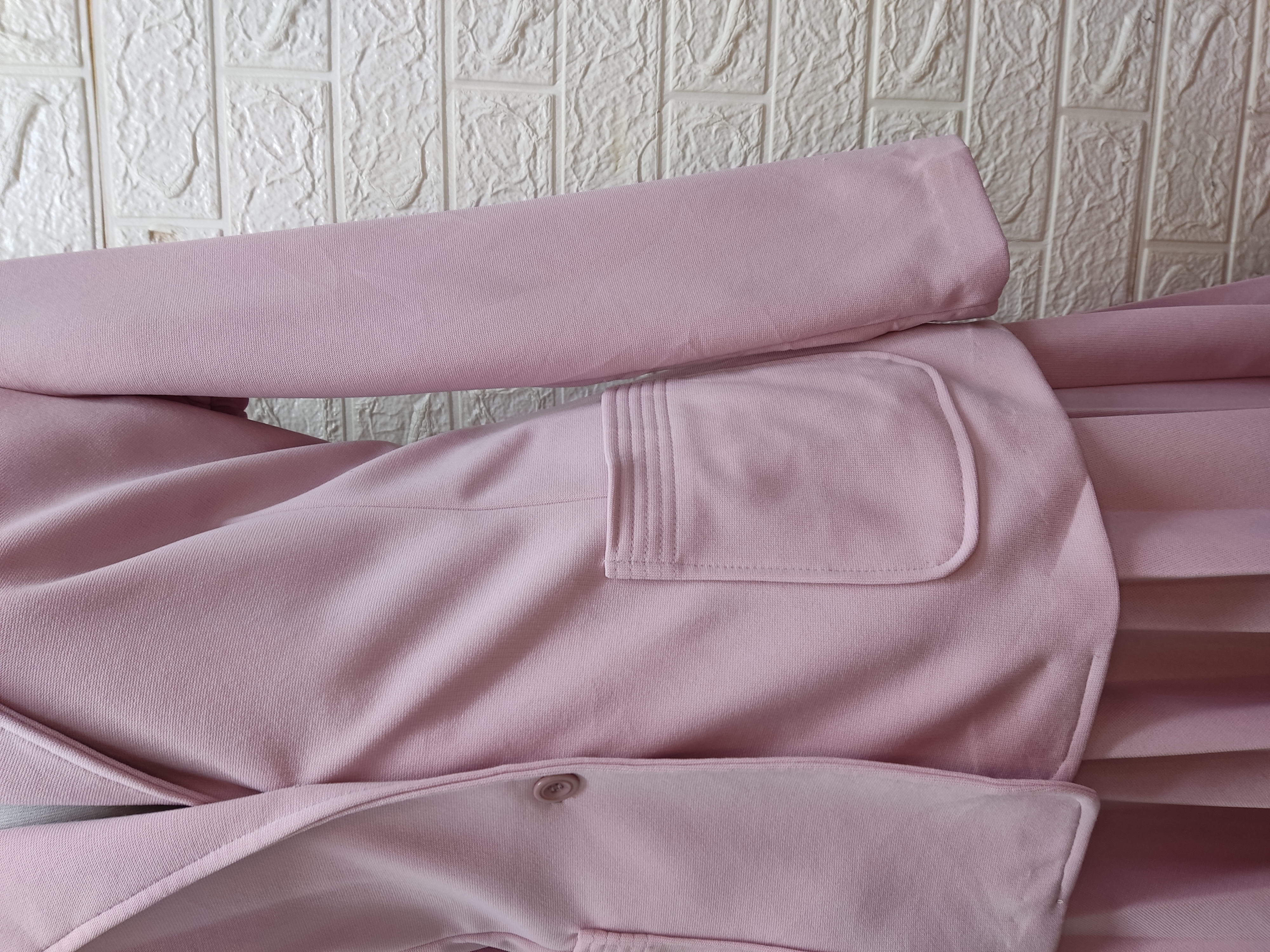 Traje de piezas rosa palo