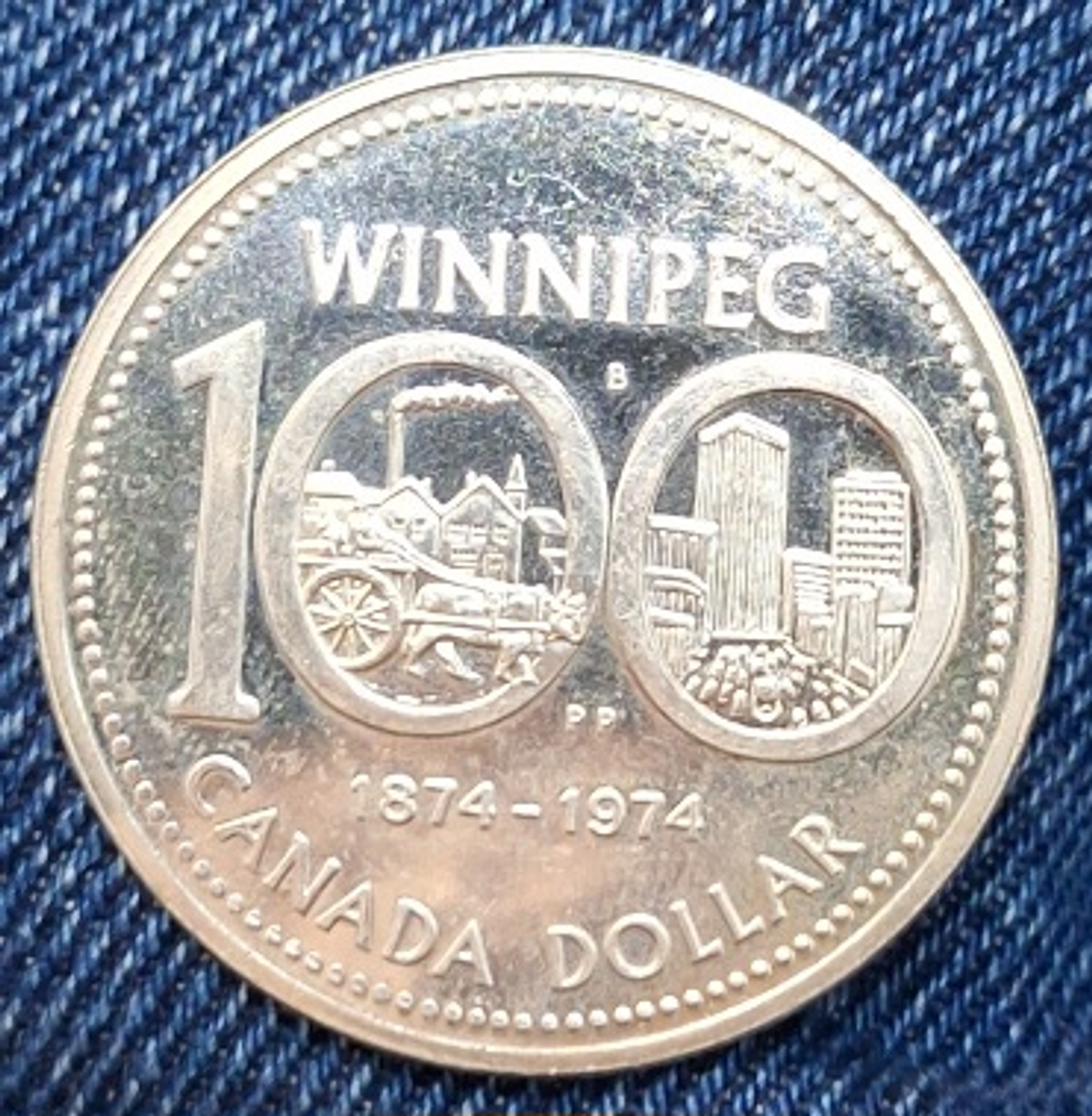 Moeda 1 dollar canadense,  100° aniversário Winnipeg 1