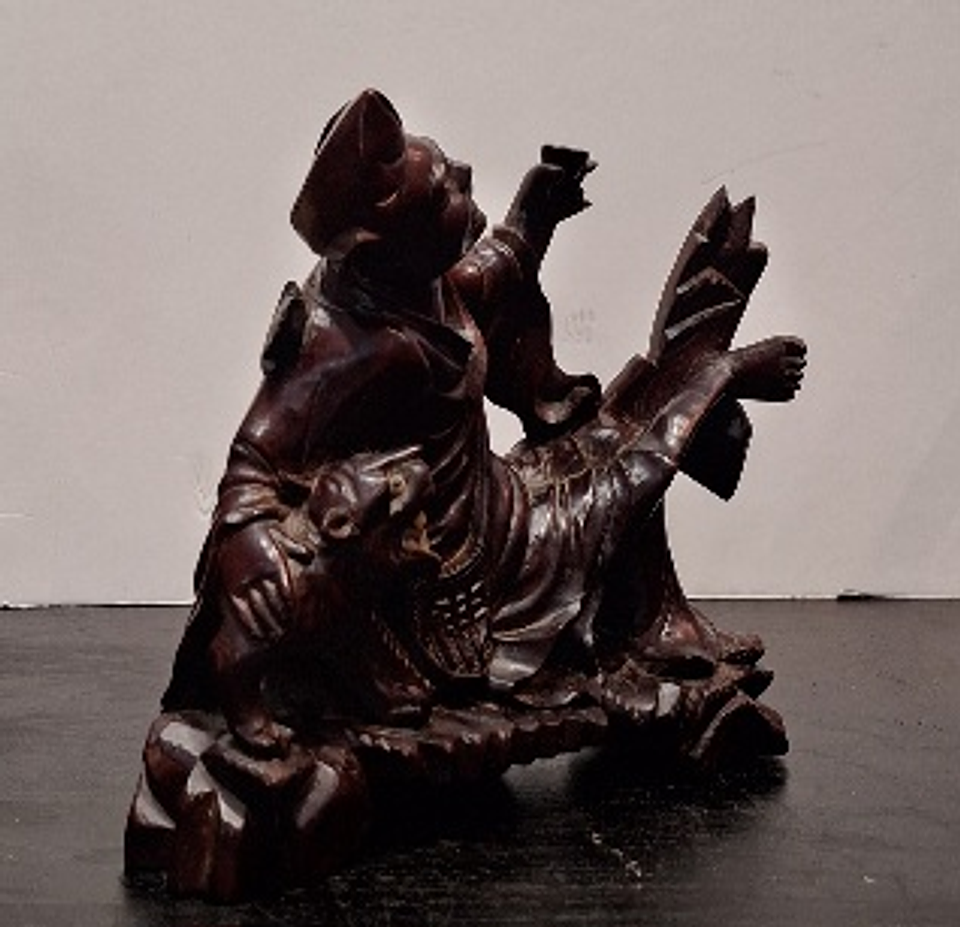 escultura oriental em madeira  1