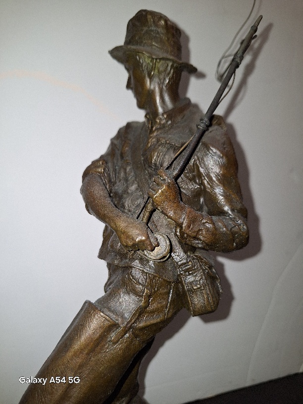 Escultura,  Pescador por Milo