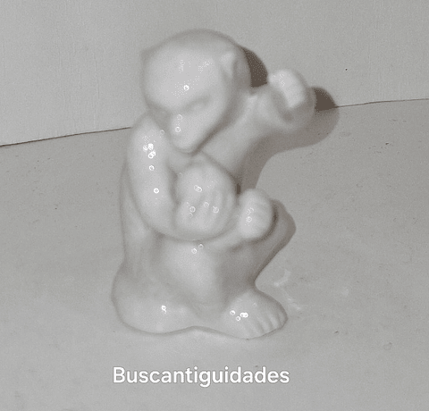 Mini Macaco em porcelana 