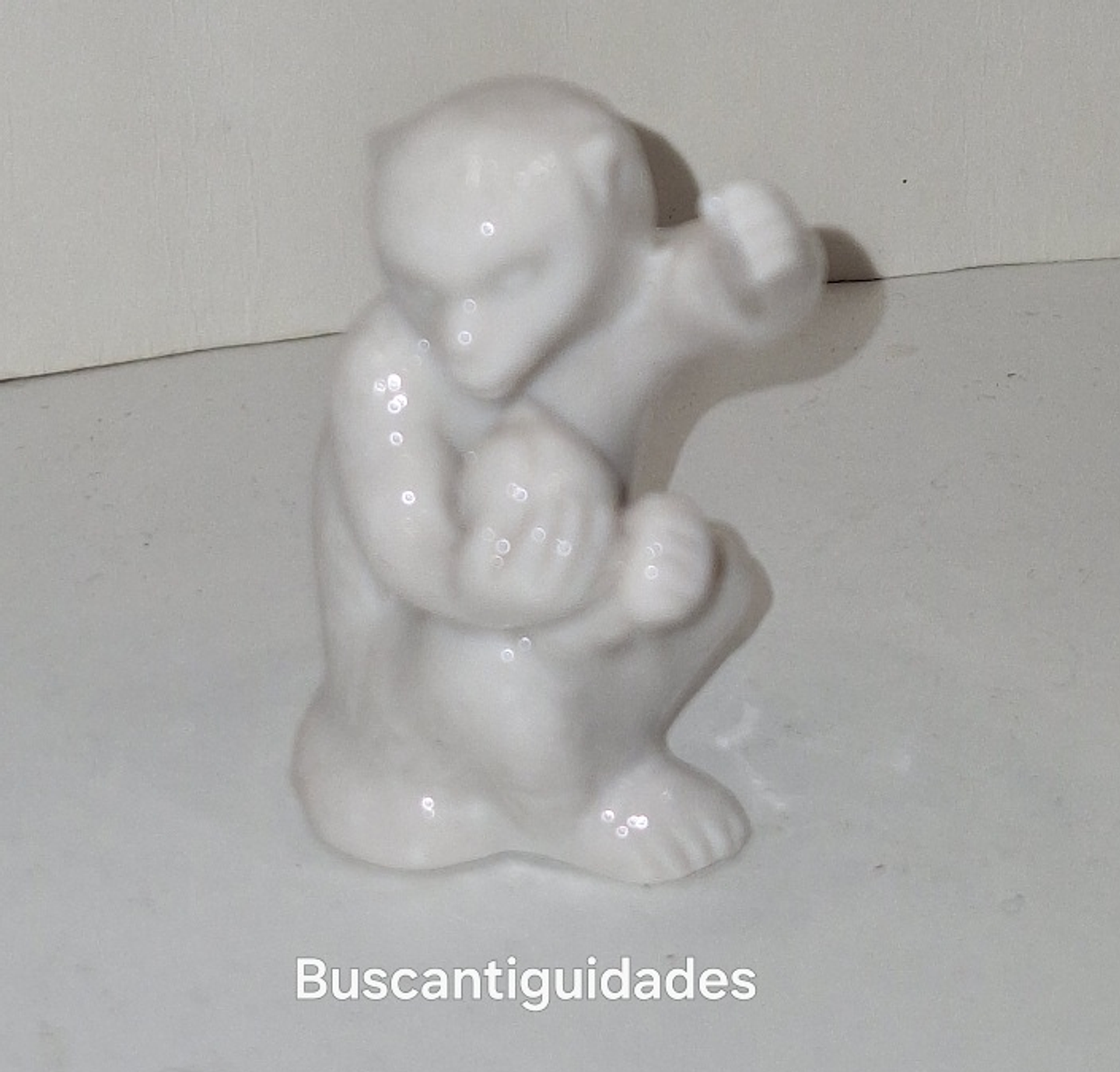 Mini Macaco em porcelana  1