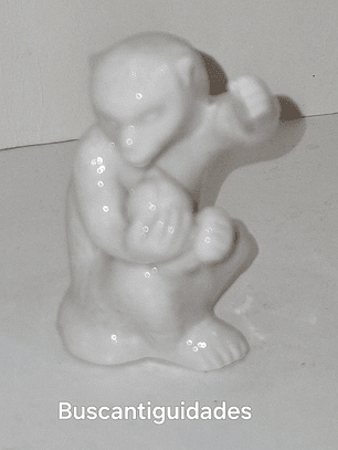 Mini Macaco em porcelana 