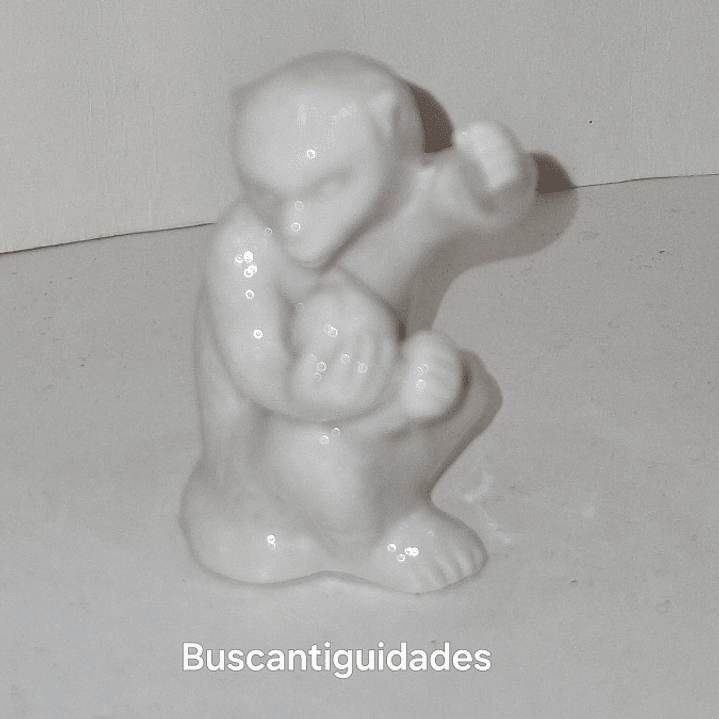 Mini Macaco em porcelana  1