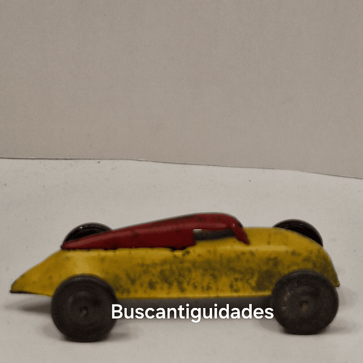 Brinquedo de lata, carro bicudo 1