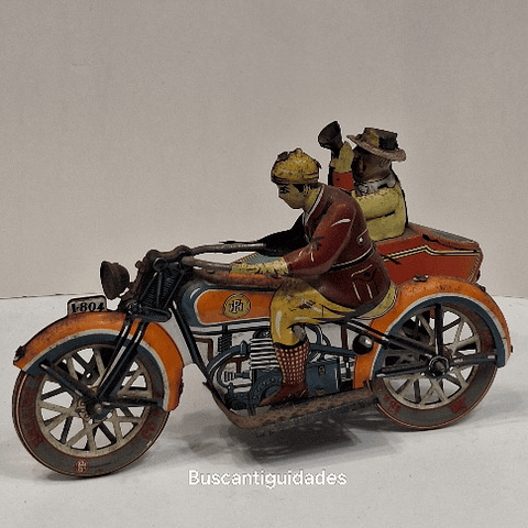 Brinquedo de lata, motociclista com sidecar
