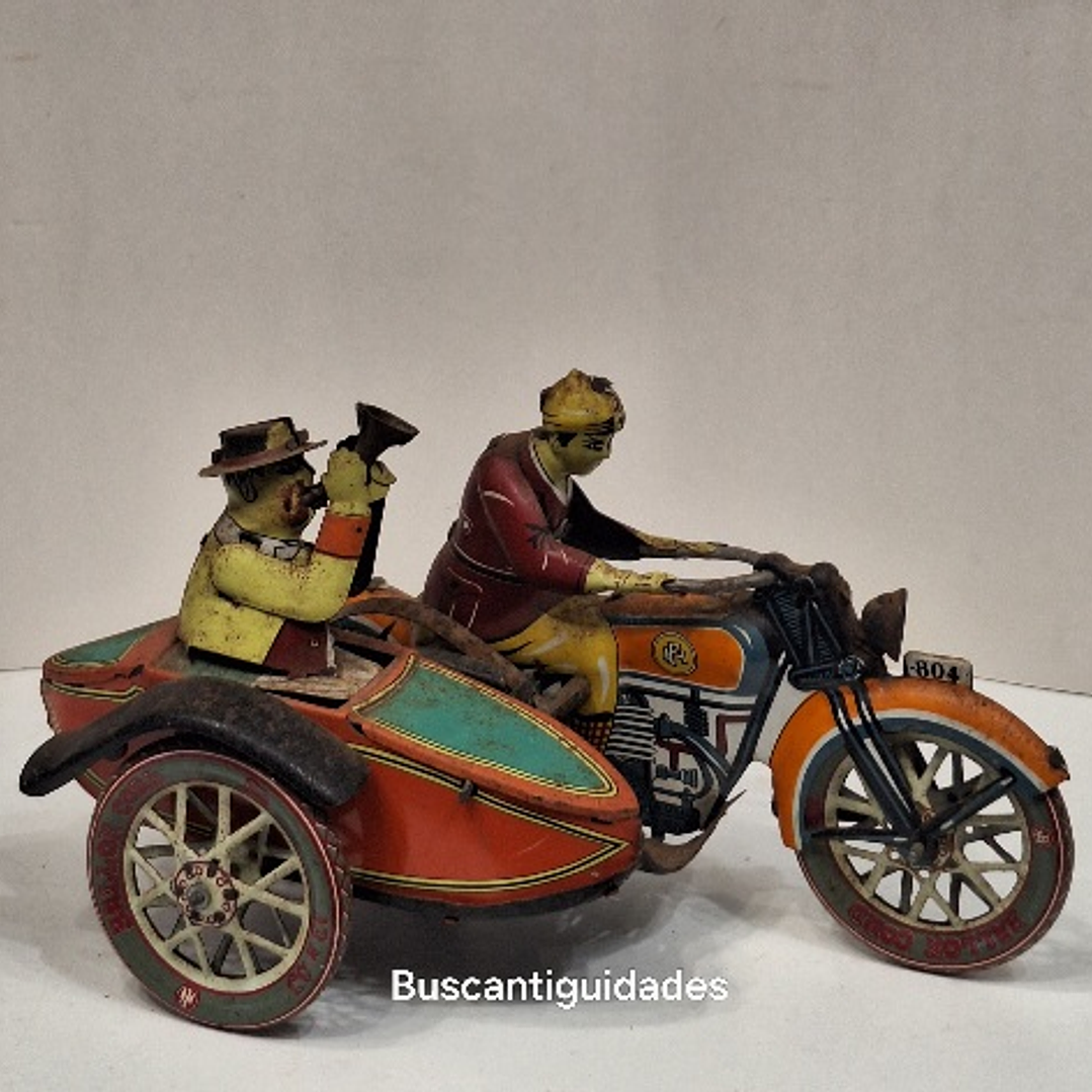 Brinquedo de lata, motociclista com sidecar 2