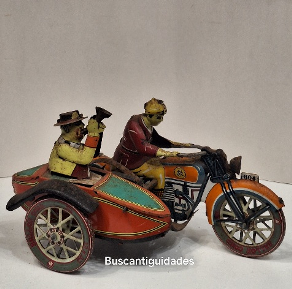 Brinquedo de lata, motociclista com sidecar 2