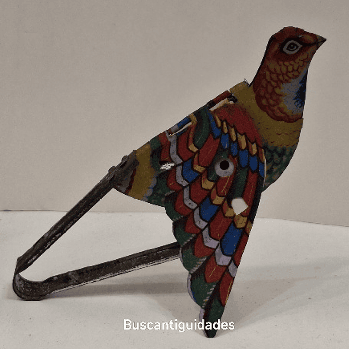 Brinquedo de lata, pássaro com fole 1
