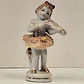 Antigo bibelot em porcelana  - Violoncelista  - thumbnail 1