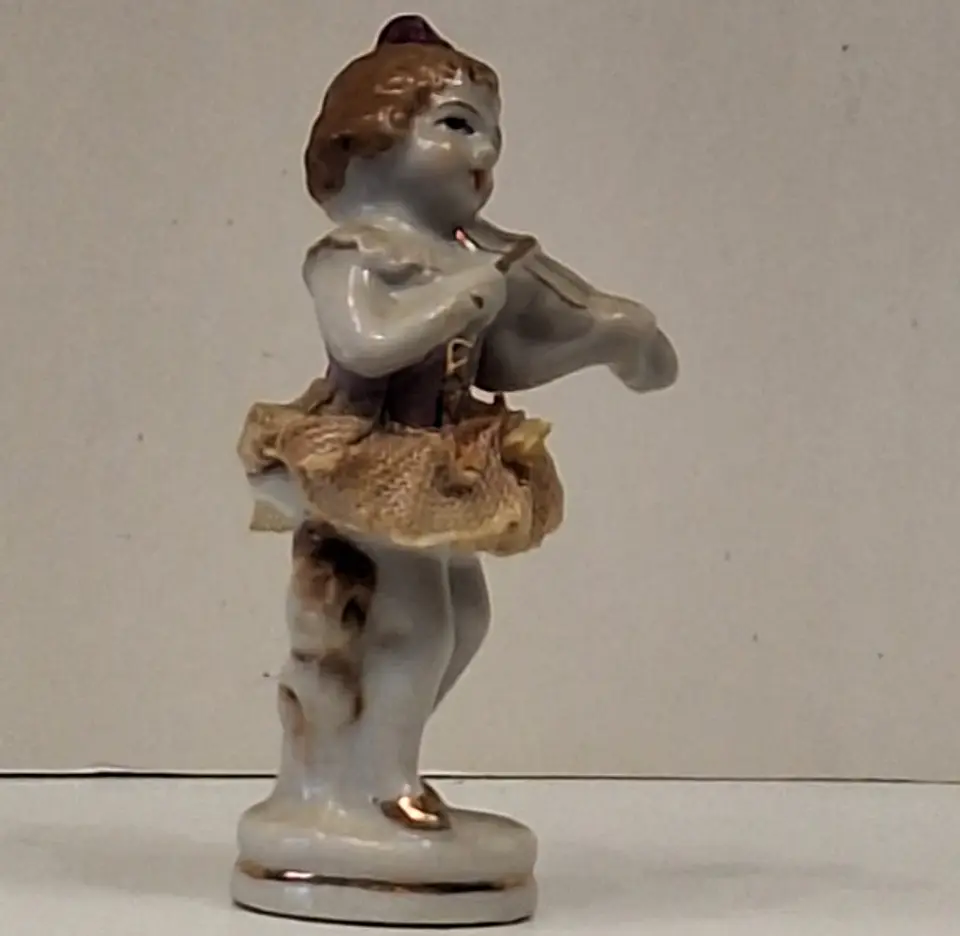 Antigo bibelot em porcelana  - Violoncelista  3