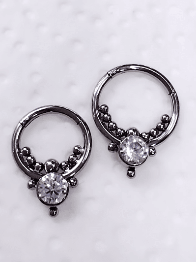 Argolla clicker de titanio con circonitas 10mm