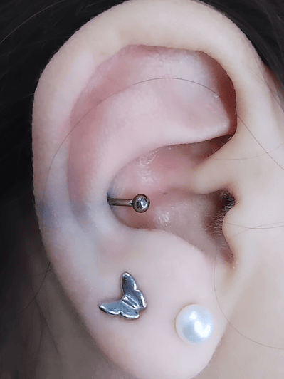 Perforacion Conch 16g con titanio grado implante