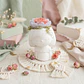 Charlotte — Menina com Flor Aromática - Thumbnail 1