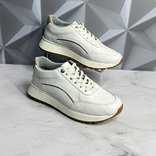 TENNIS BLANCO EN CUERO.