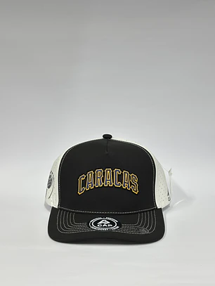 Gorra de lona 5p láser - Bicolor Negro x Blanco  / Leones del Caracas texto 