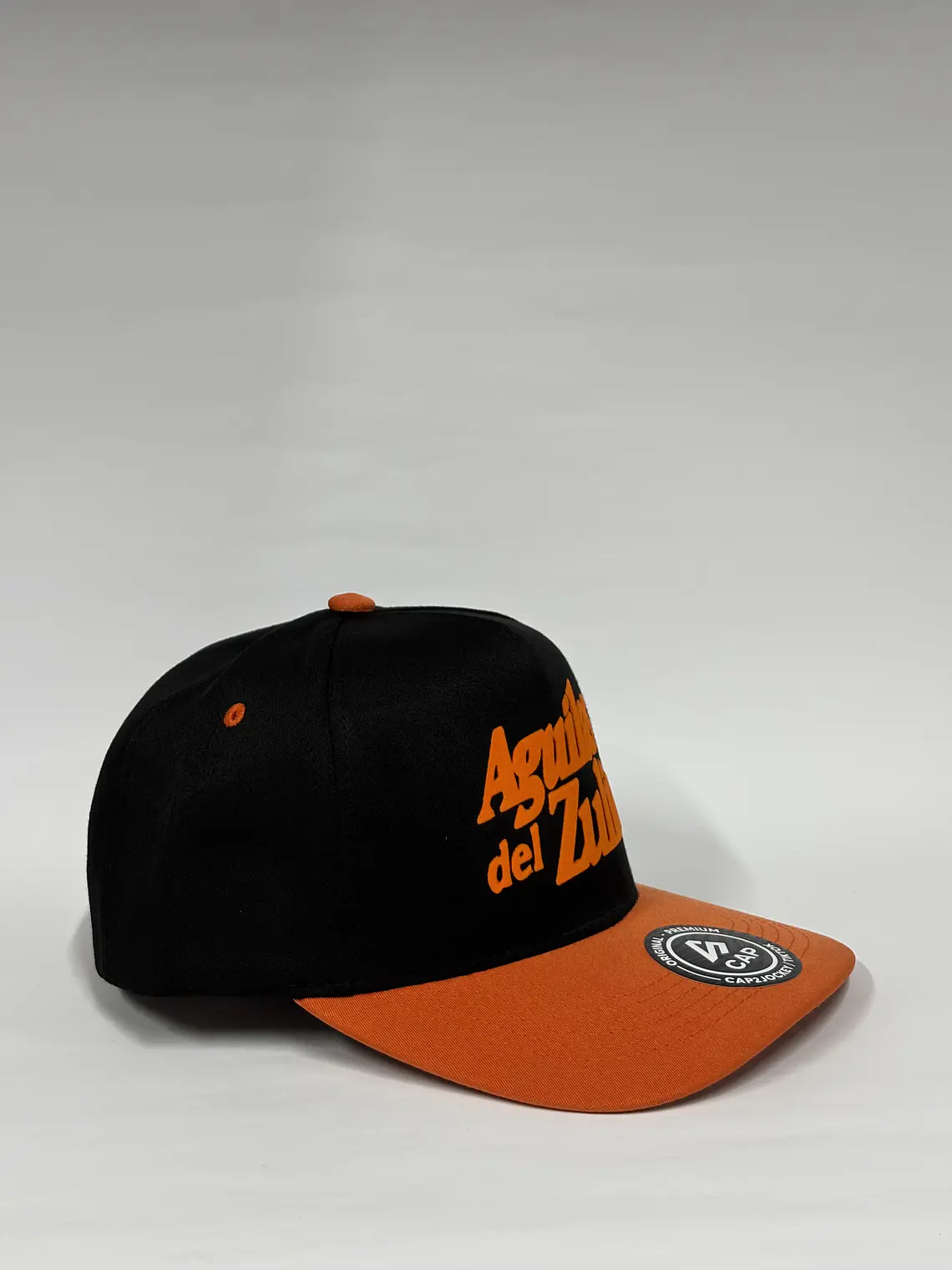 Gorra de lona 5p - Negro x naranja / Aguilas del zulia texto  2
