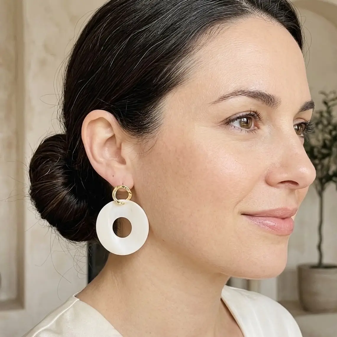 Aretes dorados con rueda de Nácar 3