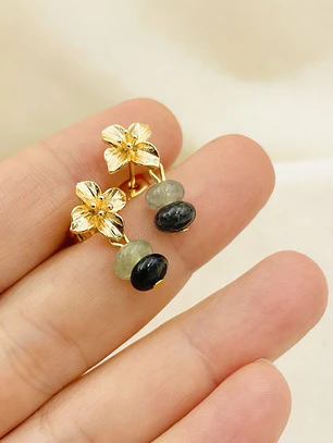 Aretes flor dorada con piedras verdes