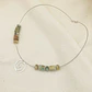 Collar ¨Espiral de tierra¨ en plata y piedras - Miniatura 1