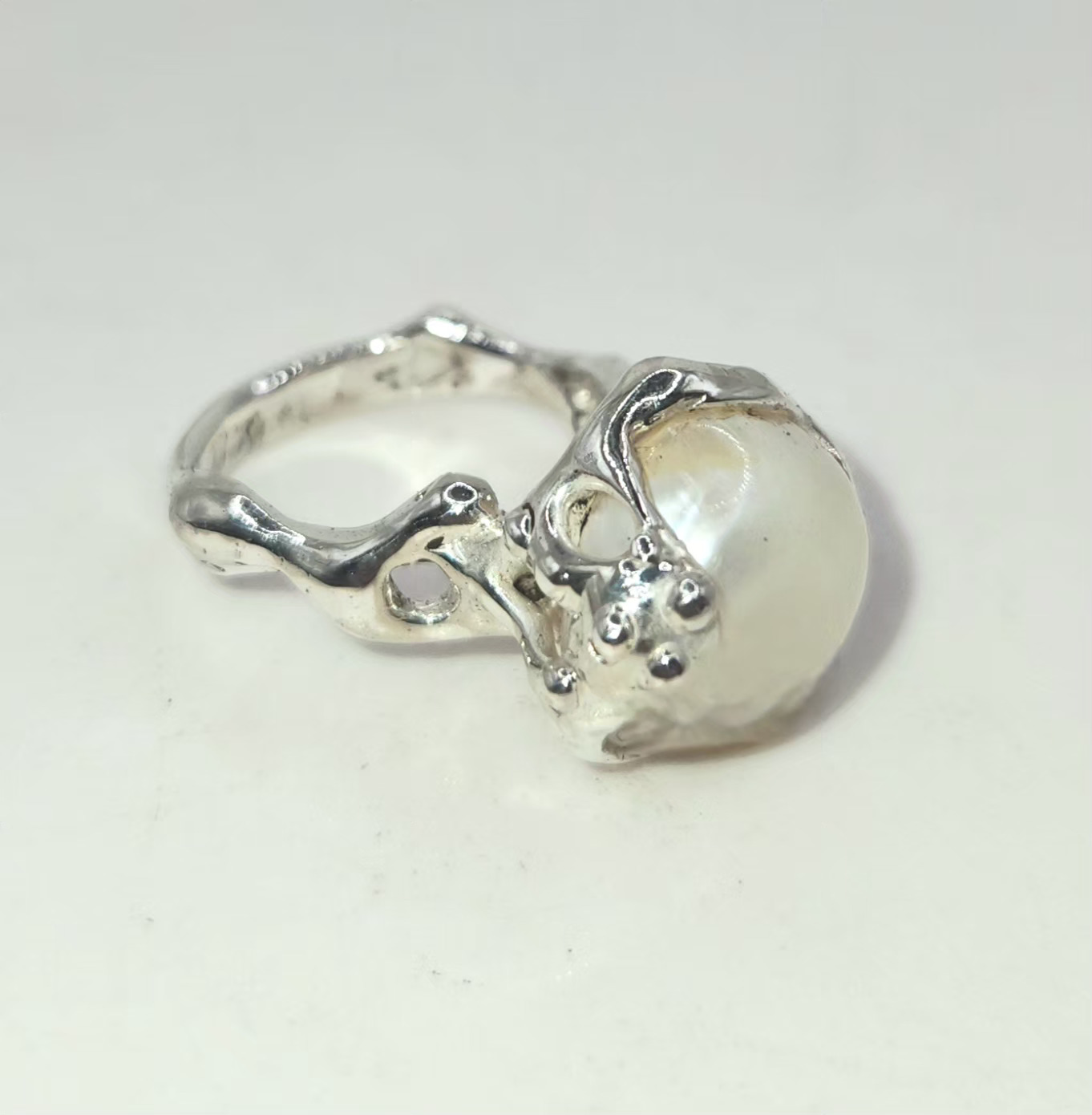 Aros doble flor con perla barroca natural plata