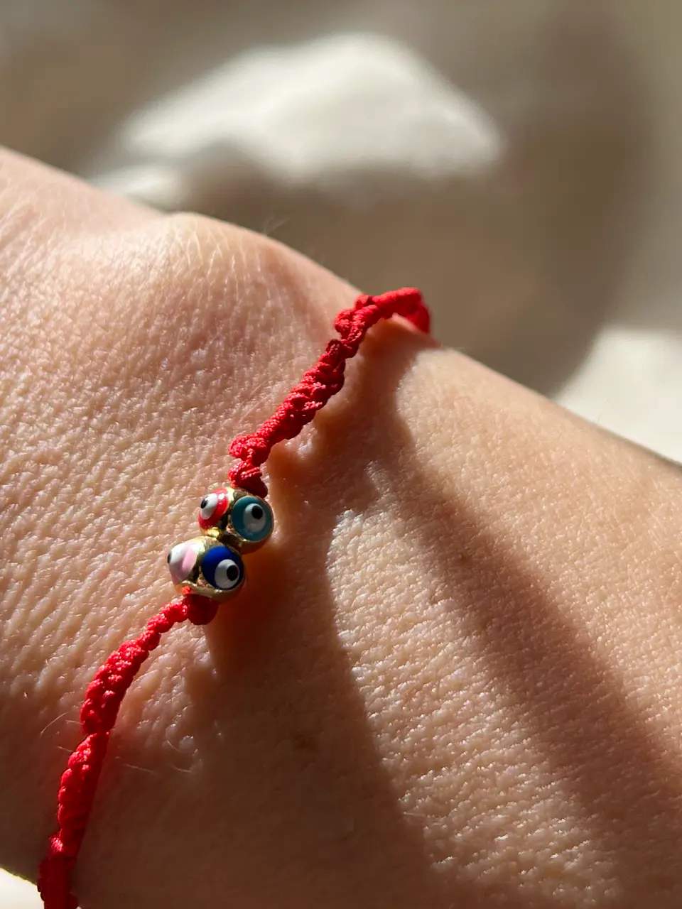 Pulsera hilito rojo  con piezas turca de ojo turco protector 1