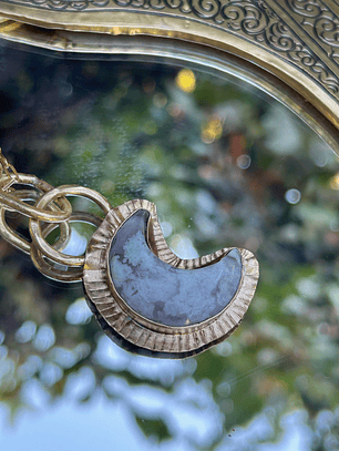 colgante luna calzedonia