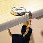 Colgador de cartera, Tucuquere 3