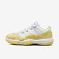 Jordan 11 Retro Low Yellow Snakeskin (Women) - thumbnail 1