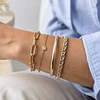 Cómo mezclar joyas doradas y plateadas con estilo: guía práctica