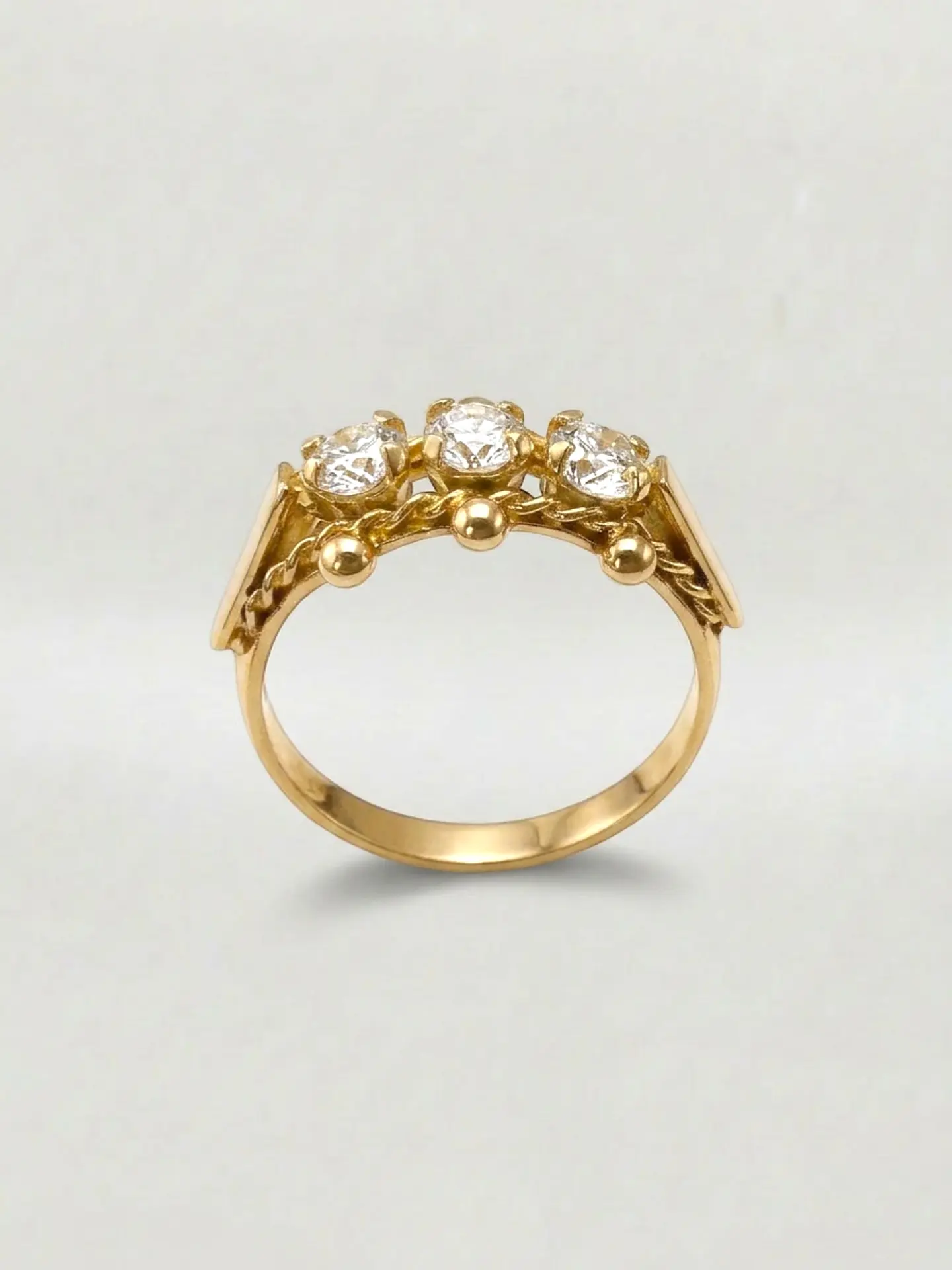 Anillo Trilogía de Resplandor Circón Oro 18k 2