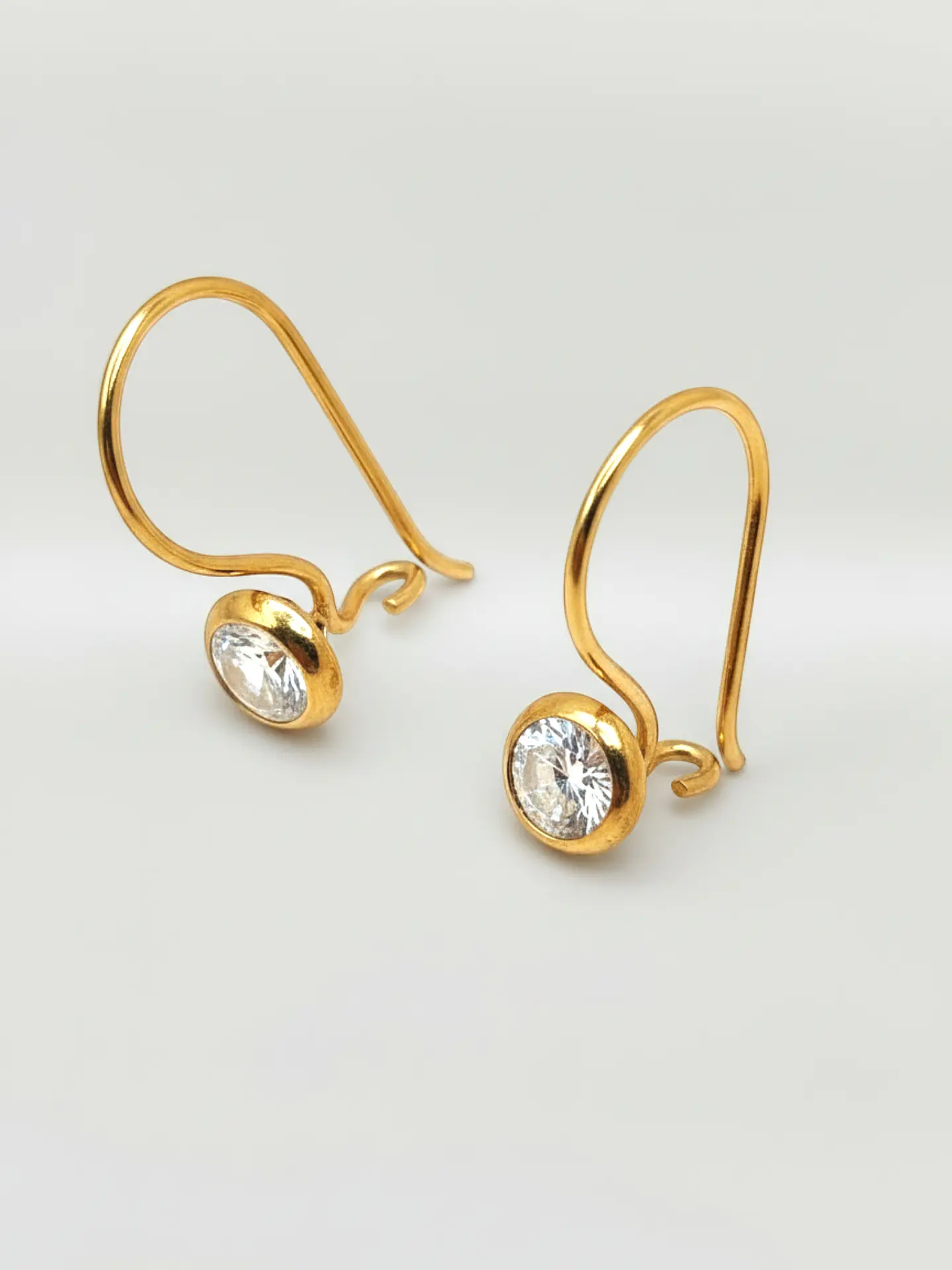 Aros Punto de Luz Resplandor Circón Oro 18k 2