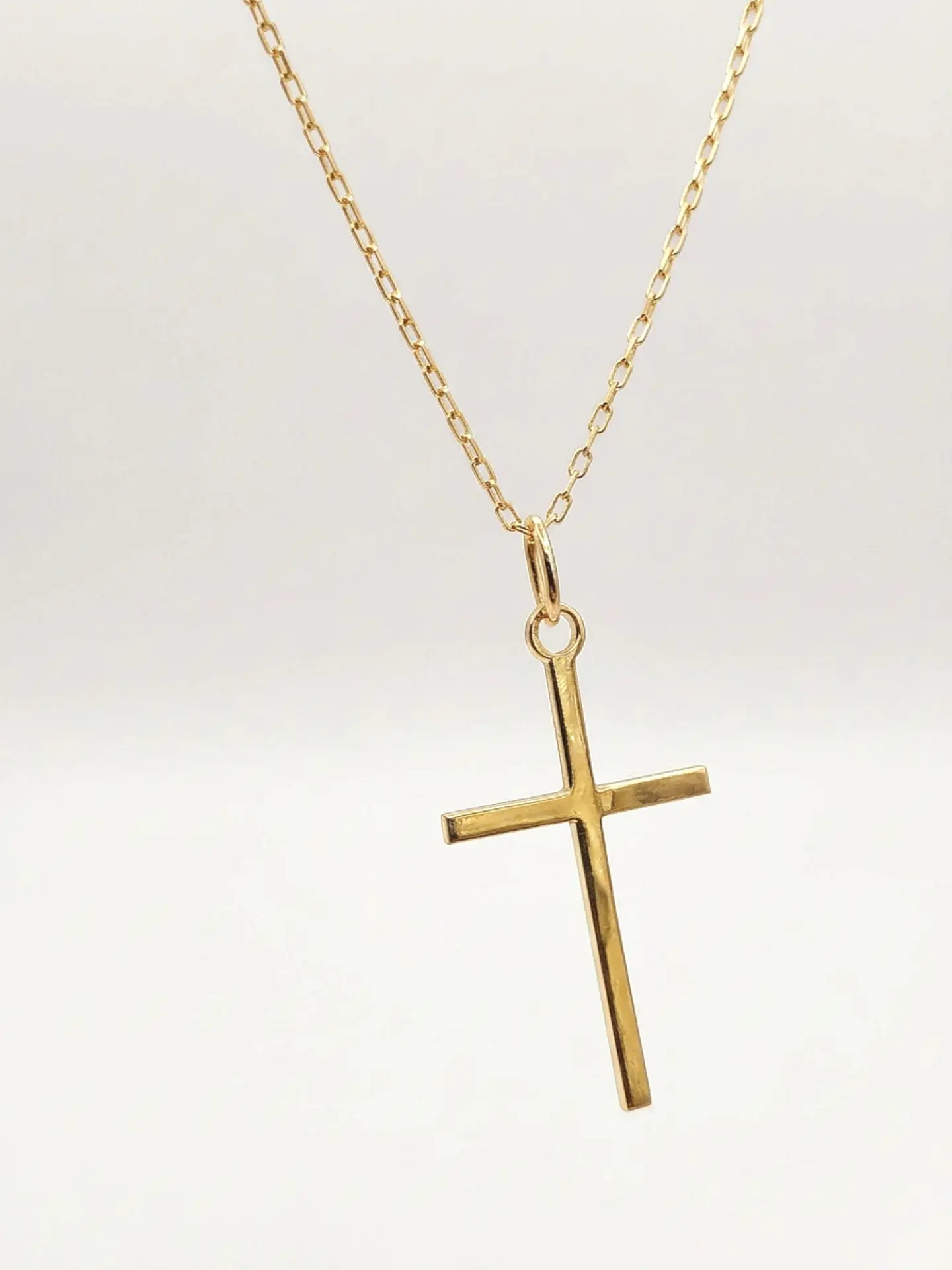 Cadena Cruz Estilizada de Fe Oro 18k 5