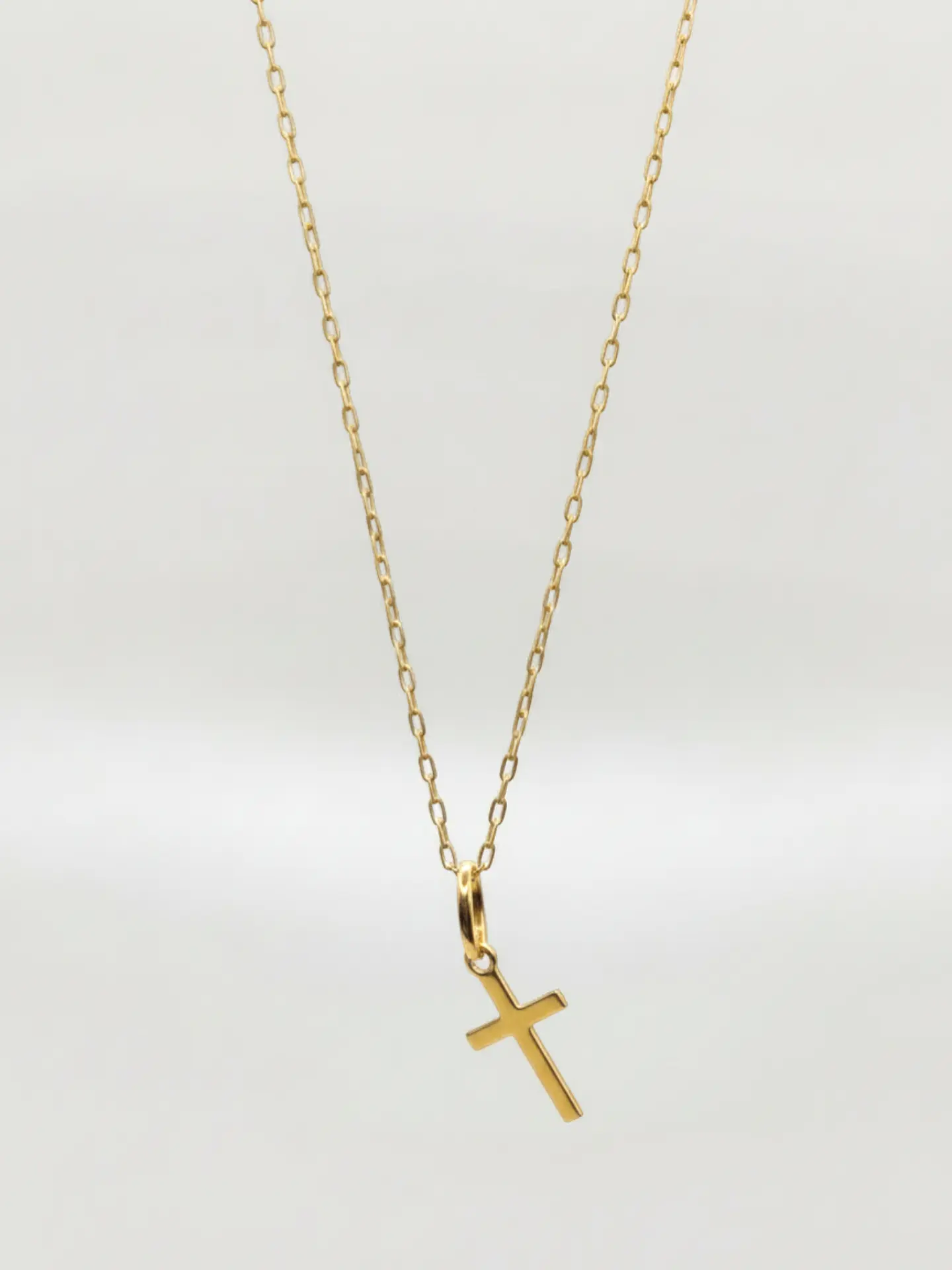 Cadena Cruz Estilizada Esencia Oro 18k 2