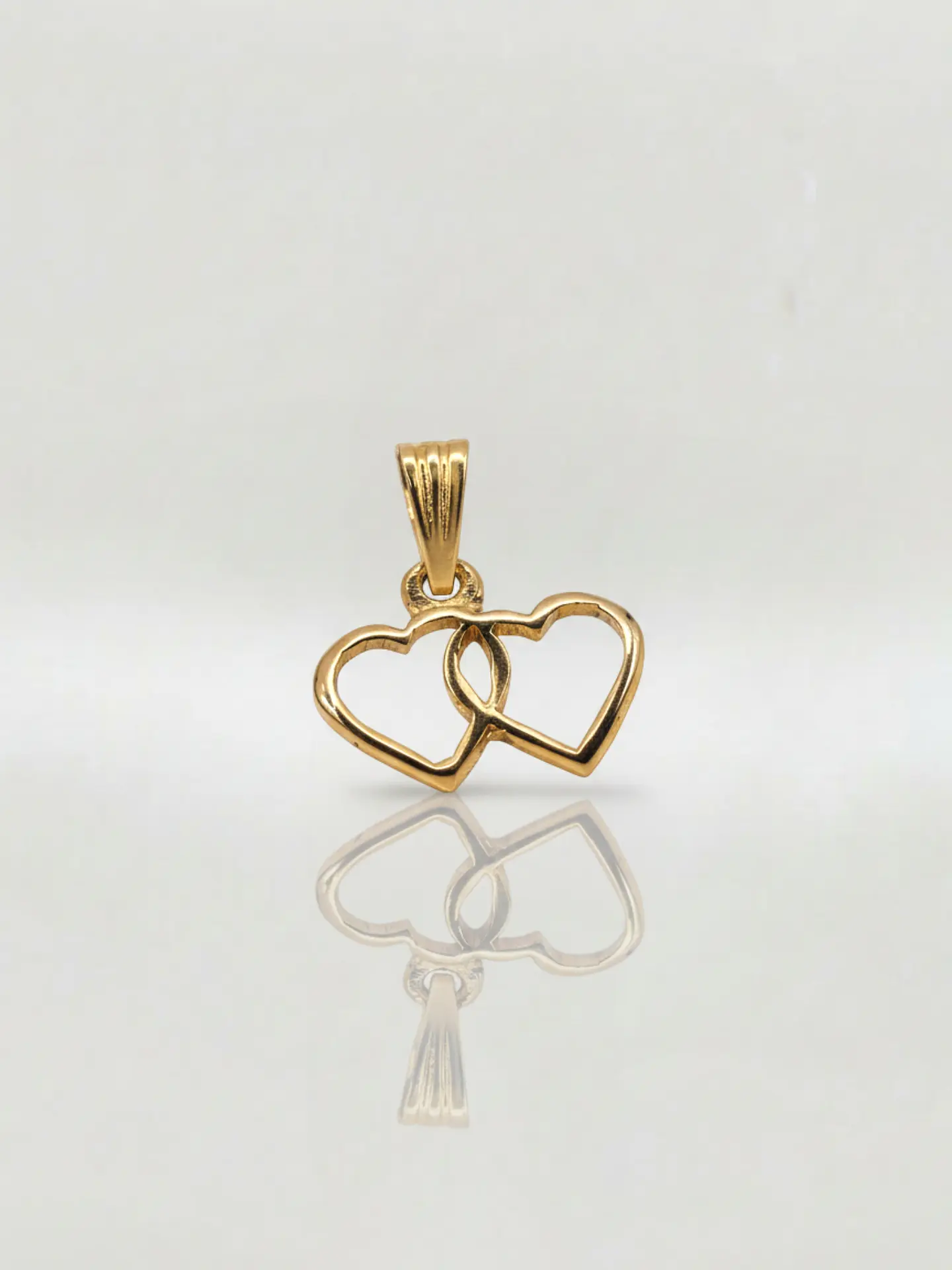 Colgante Silueta Doble Corazón Oro 18k 1