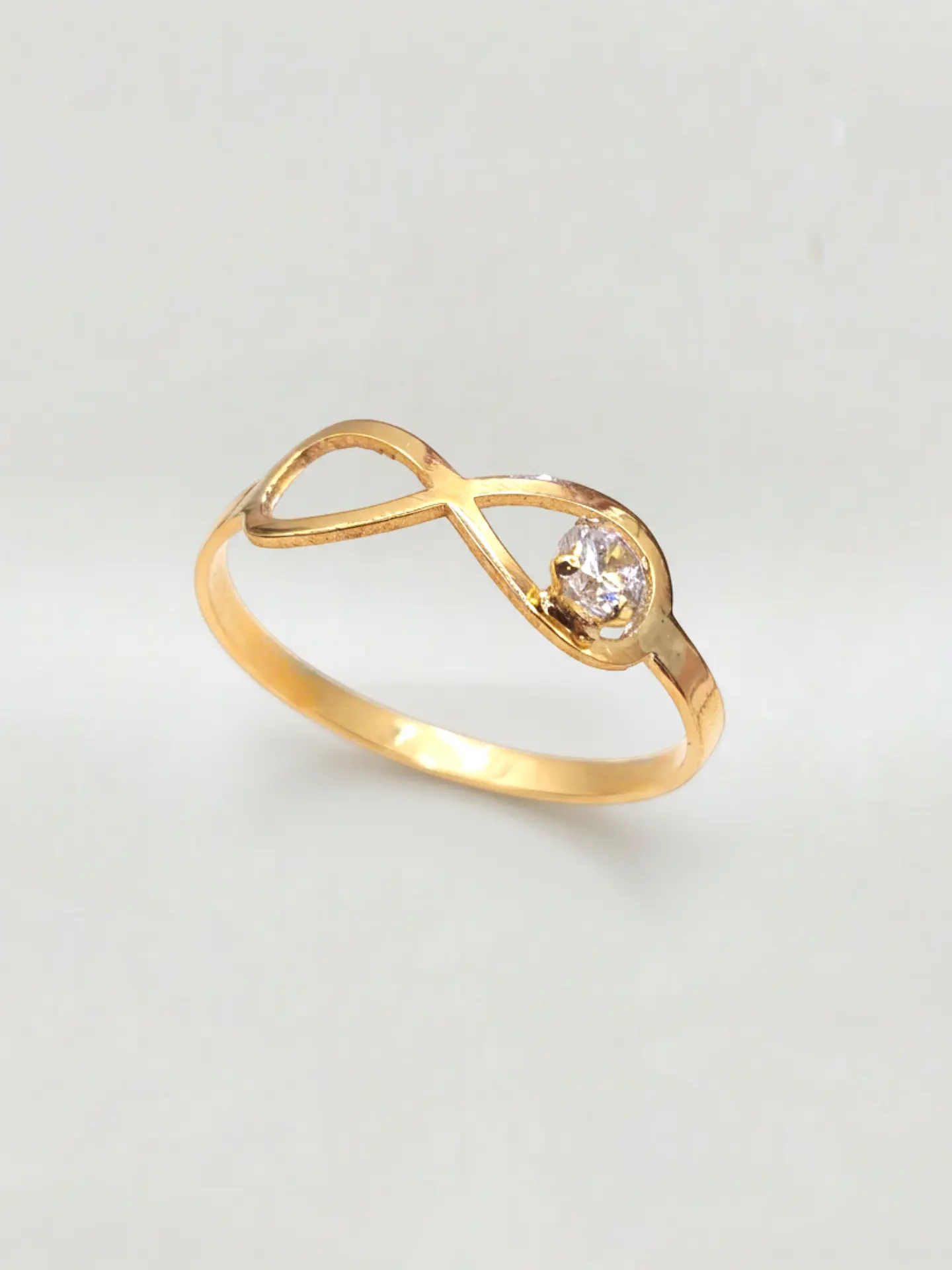 Anillo Infinito Destello de Circón Oro 18k 5