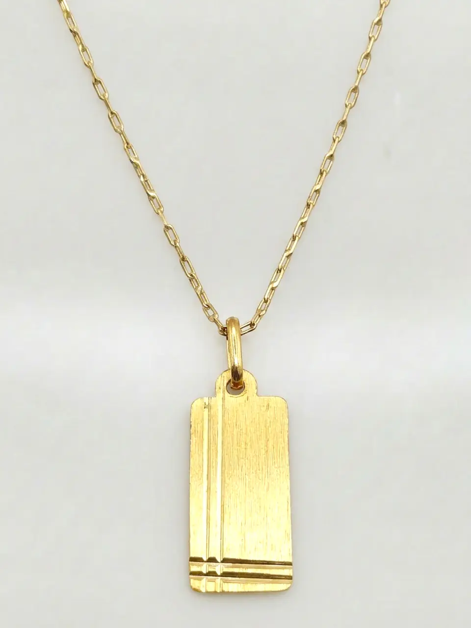 Cadena Placa Esculpida de Autor Oro 18k 1