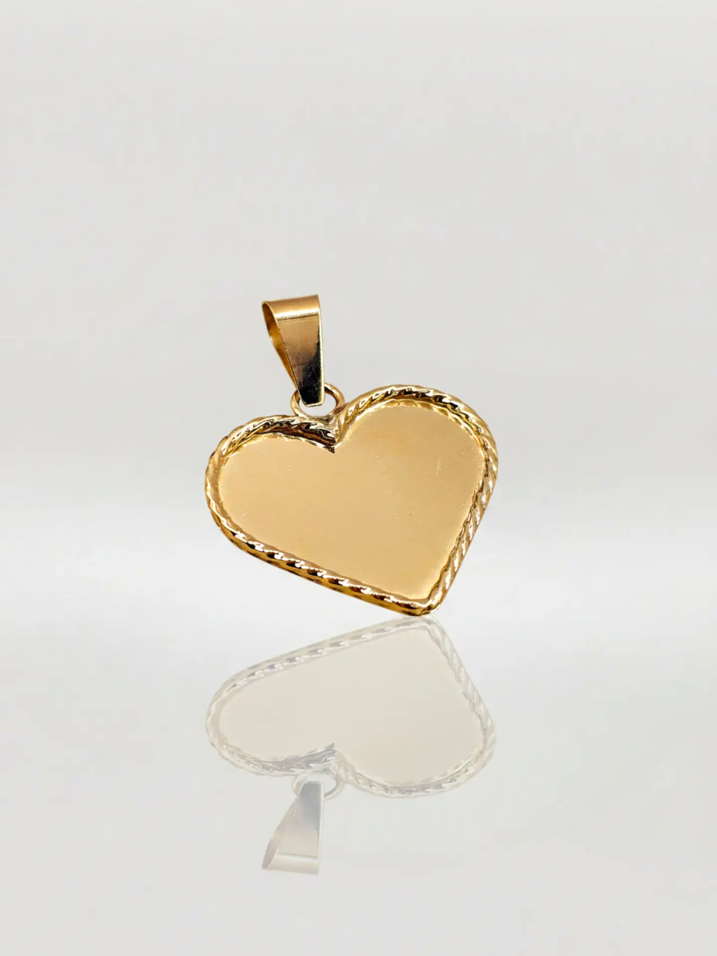 Colgante Corazón Trenzado Esencia Oro 18k 3