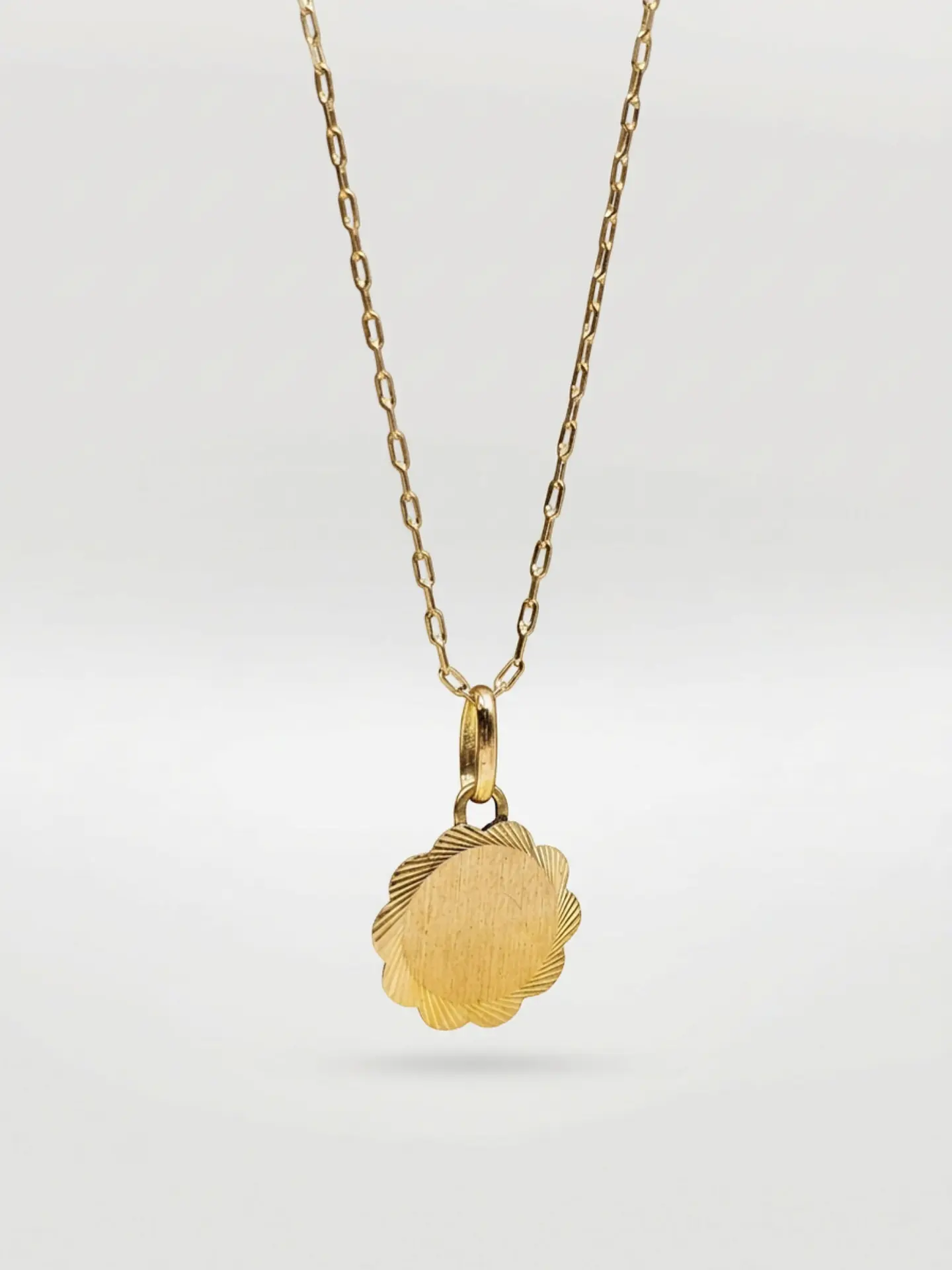 Cadena Disco Flor de Mayo Oro 18k 4